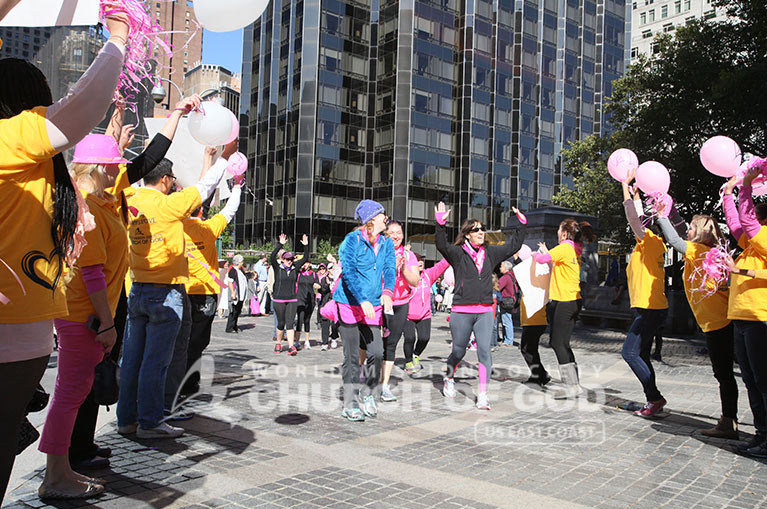 WMSCOG, World Mission Society Church of God, Chruch of God, Yellow shirts, cheering, volunteering, smile campaign, breast cancer awareness, avon, avon breast cancer walk, pink, fight cancer, nyc