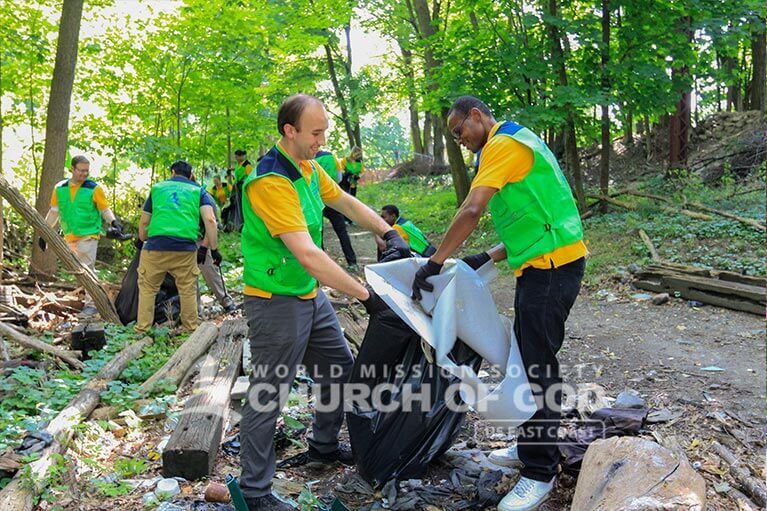 ASEZ WAO volunteers working together in unity to clean the Heritage Trail in Middletown, NY.