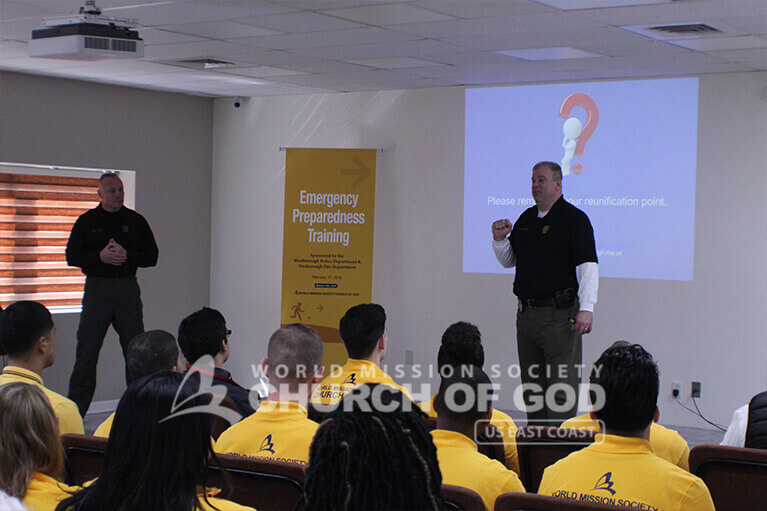 Police Sergeant Todd Rossi and Detective Chip Dapolite presenting about emergency evacuation procedures