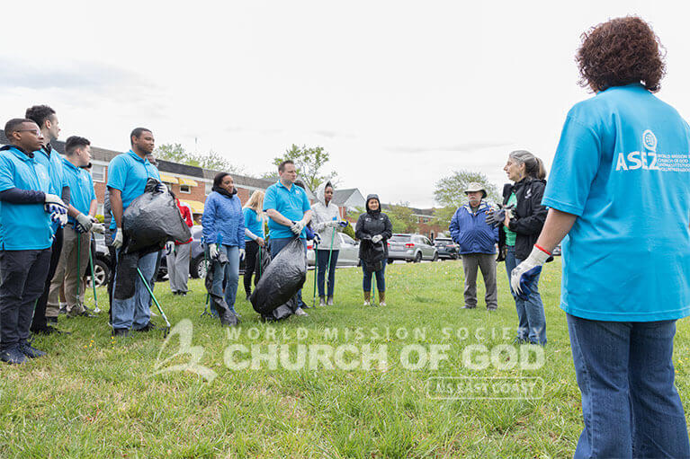 ASEZ volunteers planning out their cleanup at Herring Run Park.