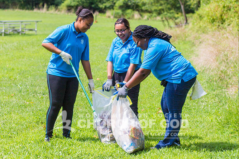 ASEZ members cleaning up Mt. Pleasant Park in unity.